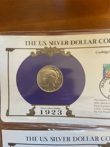 1923 us peace dollar au. 1 ounce of 90 % silver.