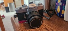 Minolta 50 mm camera SRT102 with telephoto lens