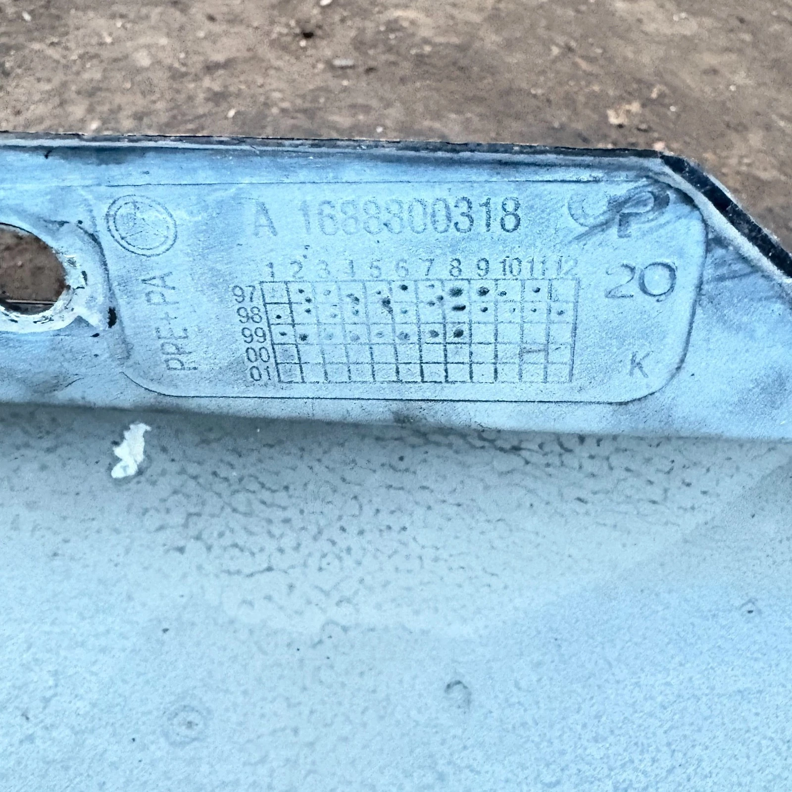 Moulded Mercedes A1688800318 part number on wing