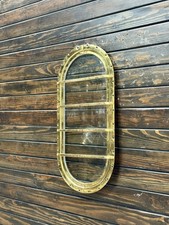 Ovale Messing-Bullaugenluke mit Käfig - geborgenes nautisches Seemannsdesign