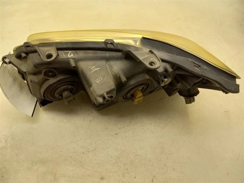 Toyota Highlander 2007 híbrido lado del pasajero conjunto de faros delanteros  Foto 3 de 4