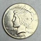 1935 satiny white BU PEACE silver dollar, some light hairlines.  #ro1