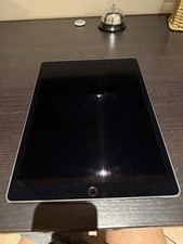 iPad Pro 12.9-inch, 2nd Gen, Wi-Fi w/ZUGU Case And Apple Pencil 64 GB BUNDLE