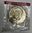 1976 D Uncirculated Bicentennial Kennedy Half Dollar in Mint Cello
