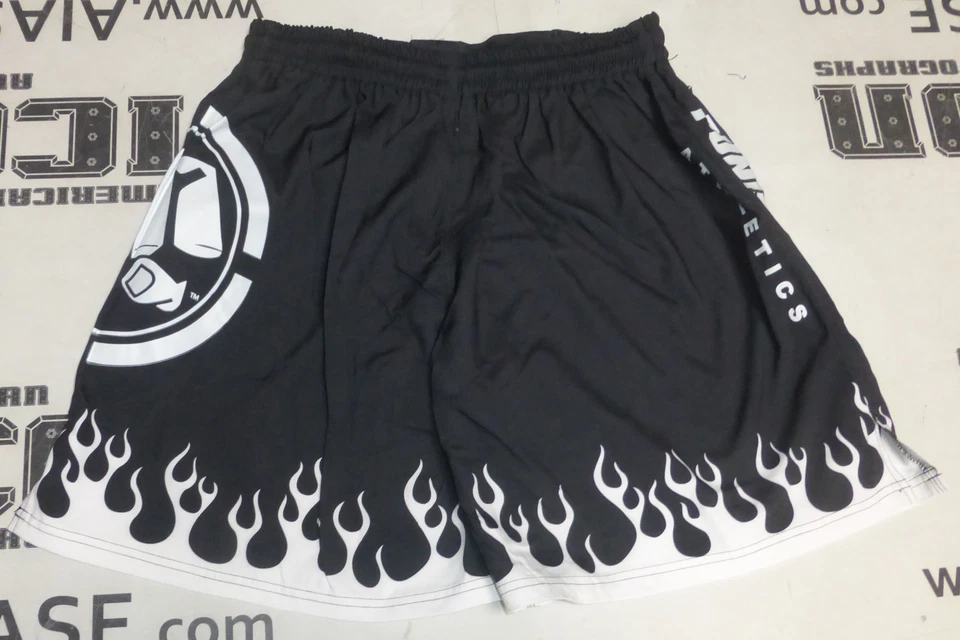Pantalones cortos de lucha modelo Bellator MMA 131 firmados por Tito Ortiz certificado de autenticidad PSA/DNA UFC 73 Foto 2 de 4