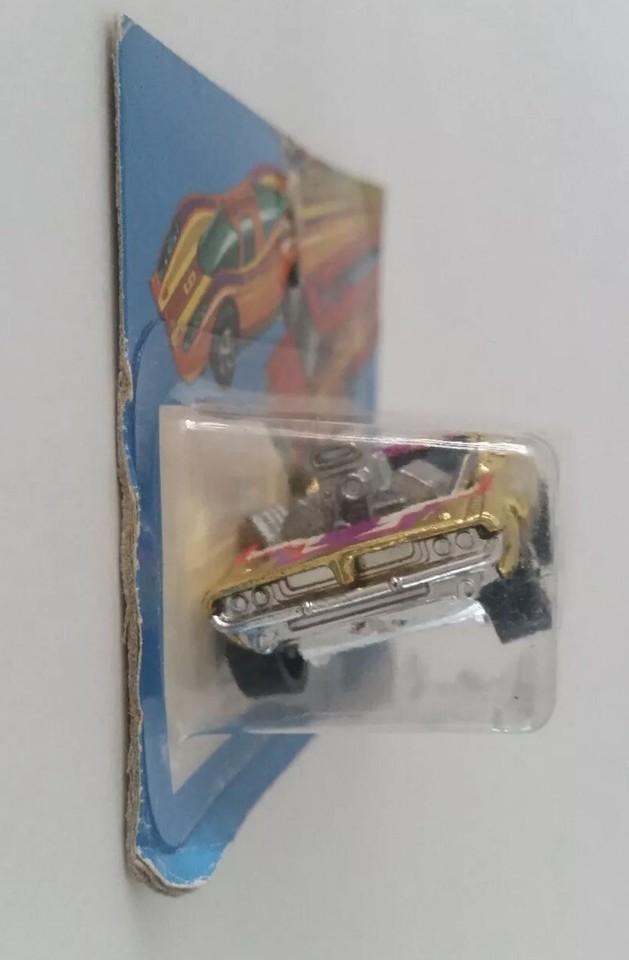 Hot Wheels Flying Colors 8259 Gold Rodger Dodger Brand New On Cut Card