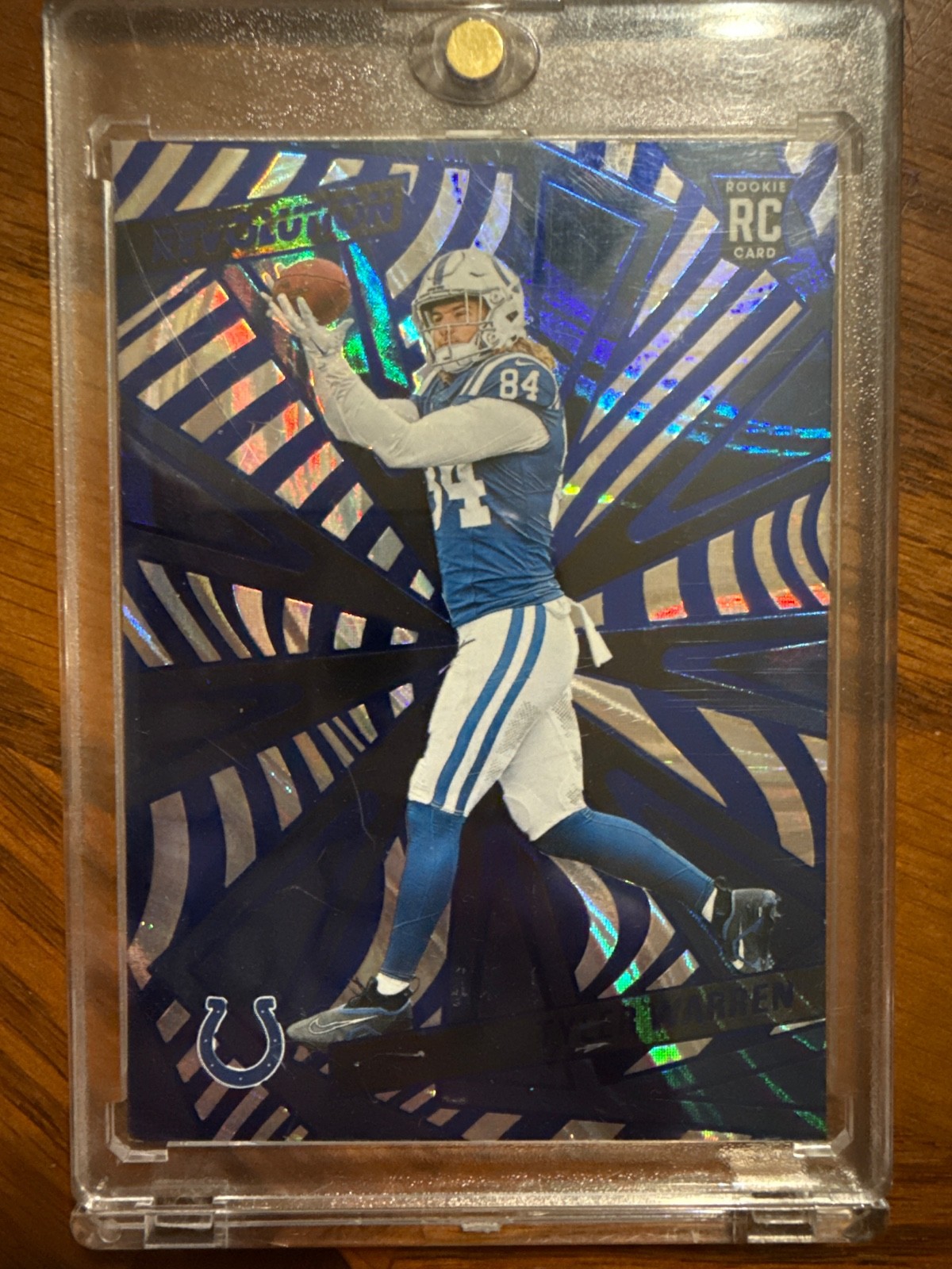 2025 Panini Revolution - Rookies Tyler Warren #247 Blue Swirl /99 (RC)