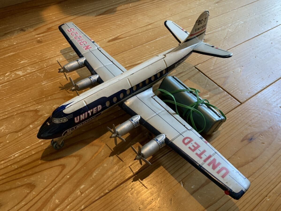 Nomura Toy DC-7 United mainliner N31225 aircraft #93 | eBay Nomura Toy DC-7 United mainliner N31225 aircraft #93 | eBay
