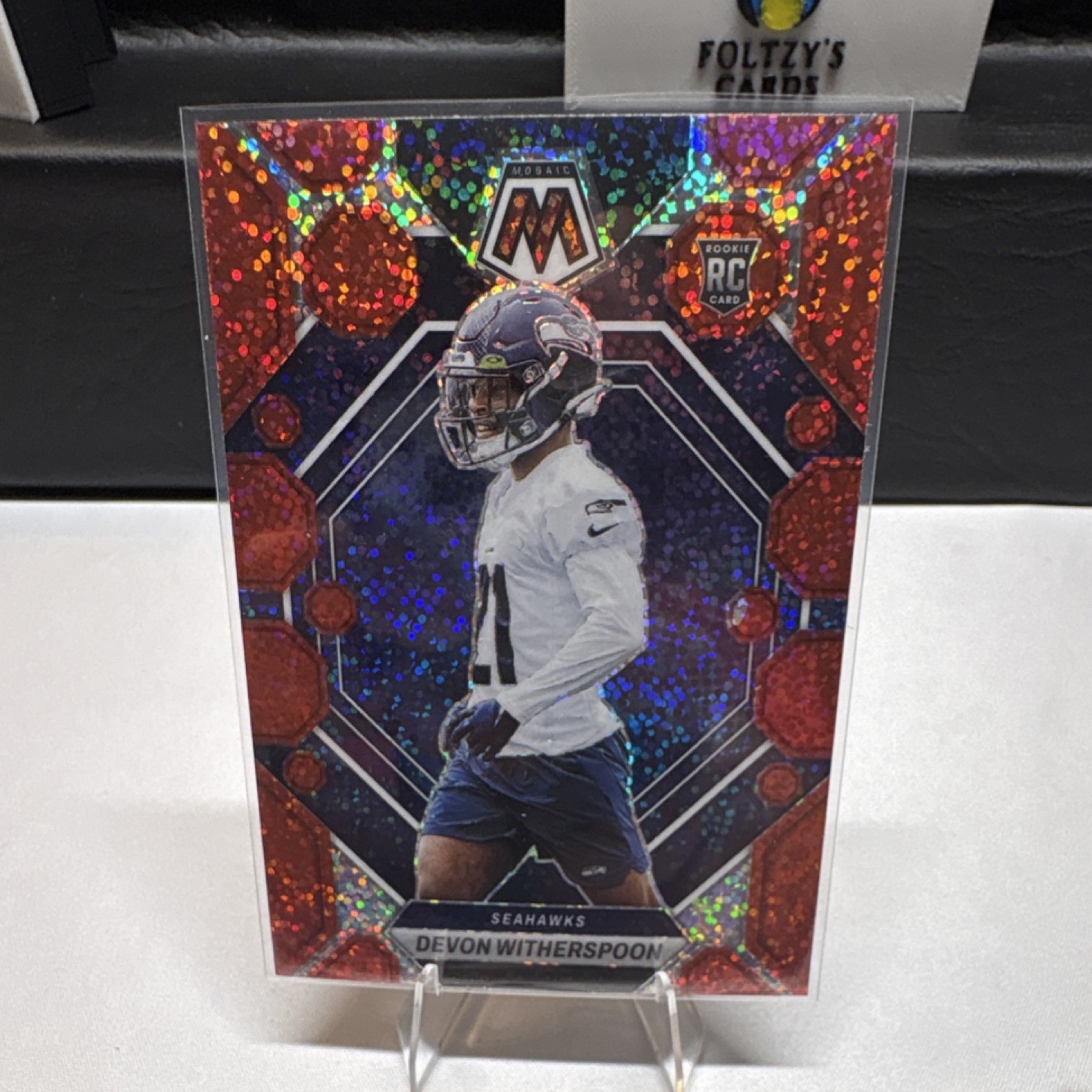 2023 Panini Mosaic Devon Witherspoon Rookie Red Sparkle Prizm #313 Seahawks