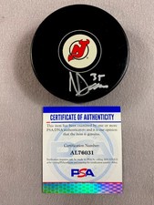 NEW JERSEY DEVILS- NICO DAWS AUTOGRAPH LOGO PUCK PSA/DNA AL76031