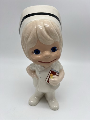 VINTAGE1981 HANDPAINTED CERAMIC NURSE FIGURINE in WHITE UNIFORM / CAP w/ LIGHT B