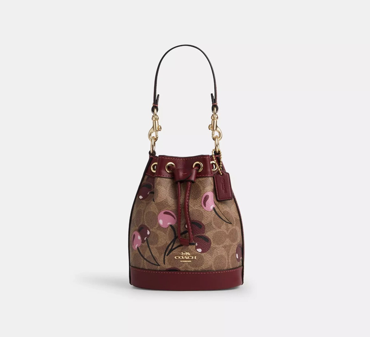 【Coach】 Mini Bucket Bag With Cherry Print ◆国内発送◆ COACH Mini Bucket Bag in Signature Canvas Cherry Print Tan