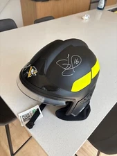 Real firefighter helmet signed by Jason Zucker
