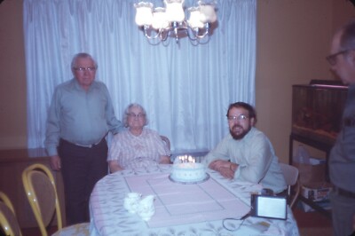 1978 Older Woman Man Grandparents Sitting Lit Birthday Cake 70s Vtg 35mm Slide