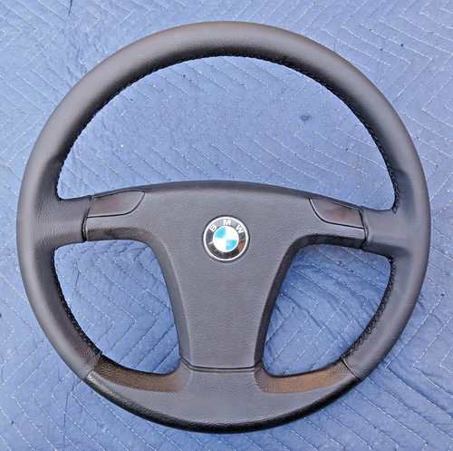 Volante deportivo BMW E24 E28 cuero puntada negra OEM *NUEVO envoltorio* 1982-1985 - Imagen 1 de 23