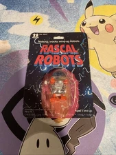 Tomy - Vintage Rascal Robots - Orange And Silver