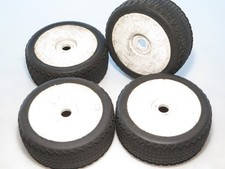 1/8 buggy Jconcepts tires mounted on 17mm hex wheels