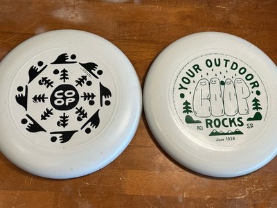 LOT OF 2 REI ROCKS COOP YOUR OUTDOORS RECYCLED PLASTIC FRISBEE TOY CO-OP