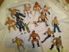 COLLECTION OF OLD ACTION FIGURE WRESTLERS HULK HOGAN UNKOWN OTHERS MR T