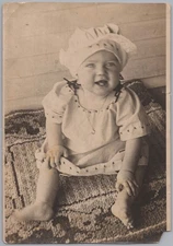 1920s Baby Infant Portrait Sitting Rug Smiling Childhood Photograph