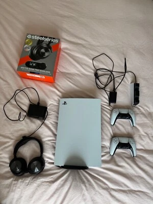 PS5 DIGITAL 2 MANETTES + CASQUE GAMING + ACCESSOIRES - Photo 1/4