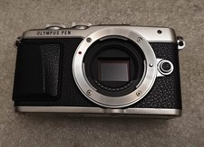 Olympus Pen Lite E-PL7 Silver 16.1MP Mirrorless Digital Camera only Body English