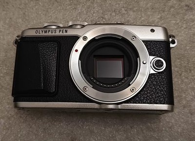 Olympus Pen Lite E-PL7 Silver 16.1MP Mirrorless Digital Camera only Body English