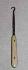 vintage 6 1/4" shoe or glove button hook with bone handle 2 pins