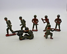 7 Toy Lead Soldiers. Abt 2 inches. One marked England  J