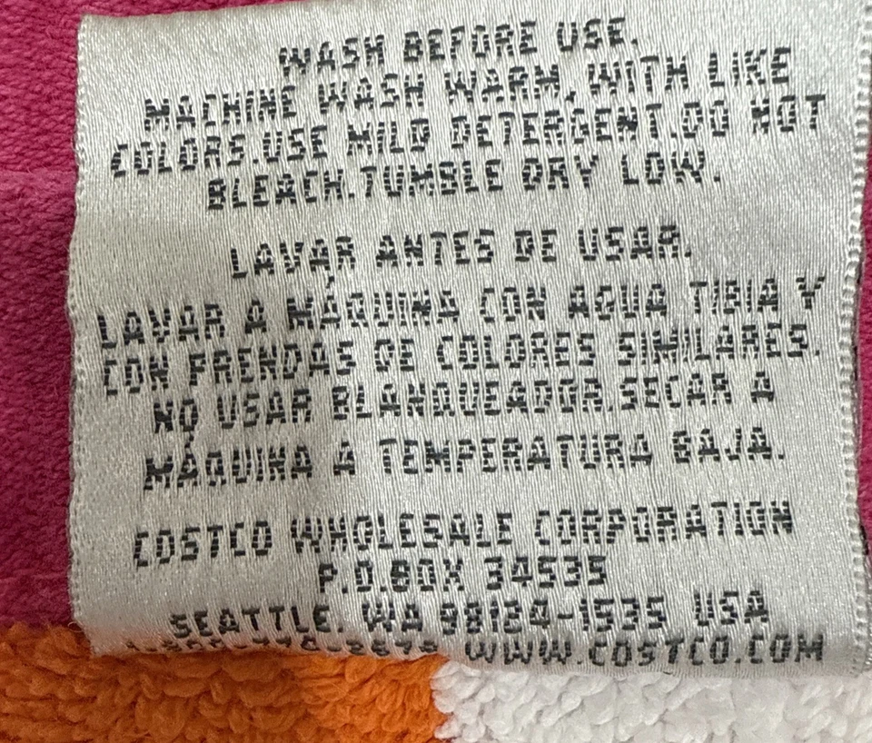 "Toalla de playa Charisma Resort Costco 100 % algodón rosa y naranja a rayas 32"" x 64""" Foto 4 de 4