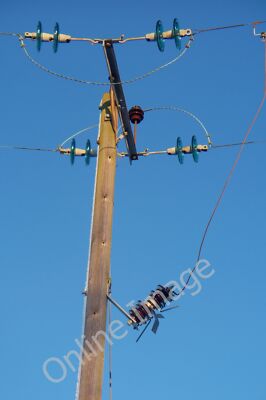 Photo 6x4 Electricity pole Longframlington The insulators reflect the win c2010