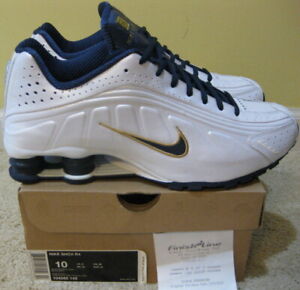 navy blue and gold nikes