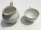 VINTAGE WHITE PITCHER AND TEA CUP "MADE IN ENGLAND" — photo 2