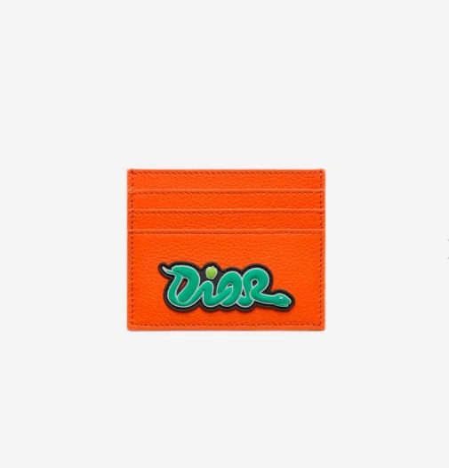Porte cartes Dior x Kaws en veau grainé vermillon, rouge (100% authentique)