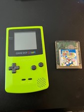 Nintendo Game Boy Color Kiwi Handheld System With Super Mario Bros Deluxe game image