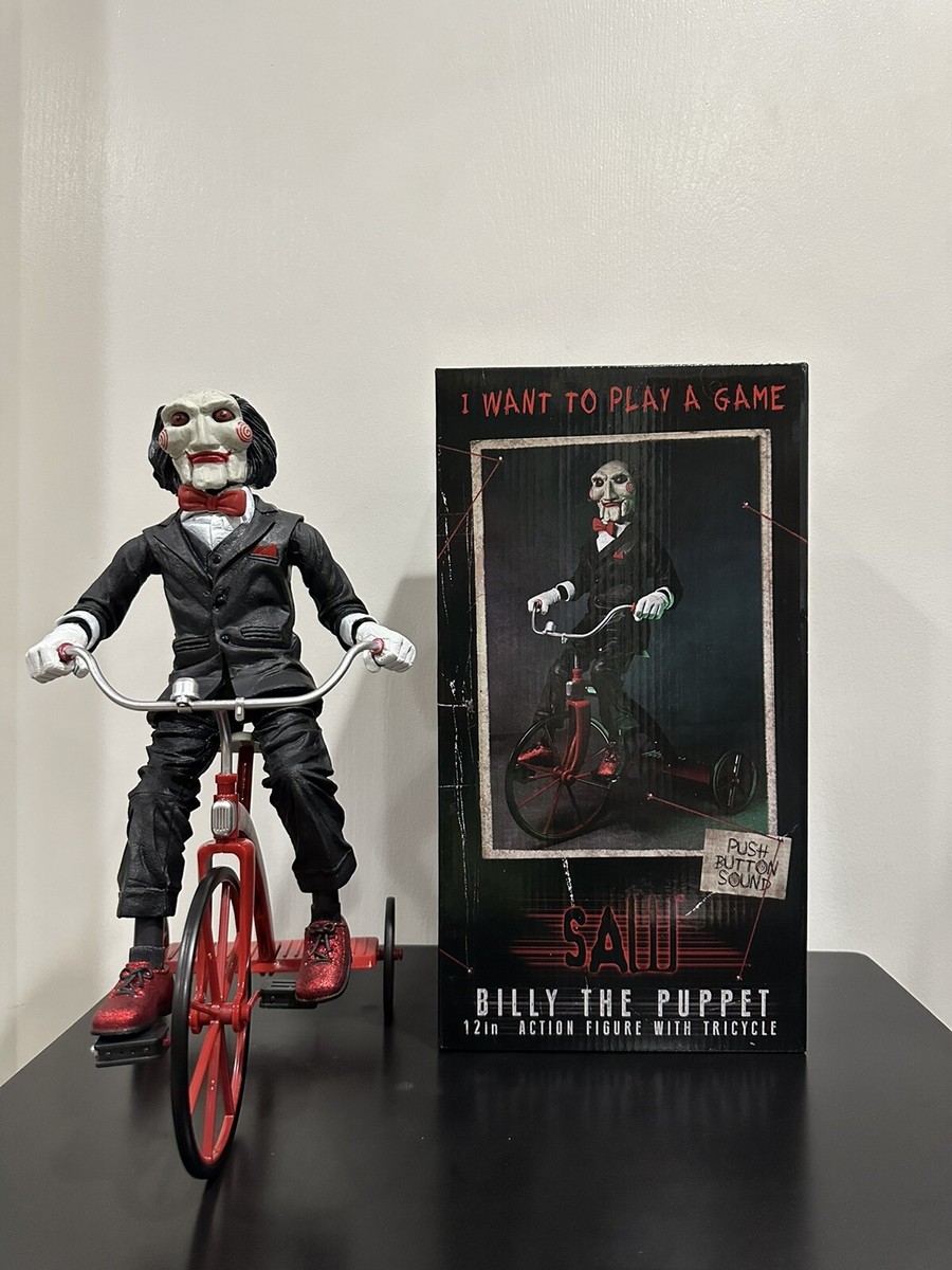 NECA Jigsaw Saw Billy the Puppet on Tricycle 12“ Action NECA Jigsaw Saw Billy the Puppet on Tricycle 12“ Action
