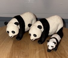 This is a Safari Ltd. panda figurine, likely from 1996 2 Adult And 1 Baby