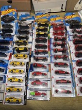 Hot Wheels Ferrari Diecast Car Lot 57 count Unopened Carts multicolor