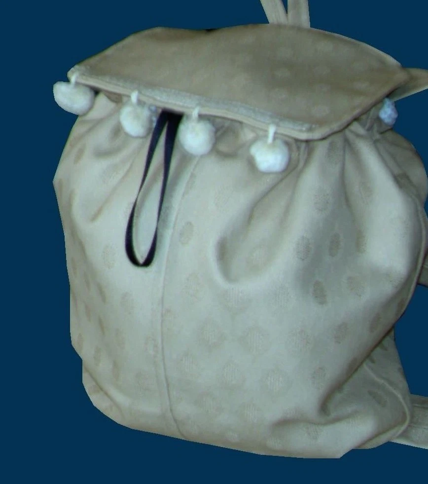 Mini backpack hotsell with pom pom