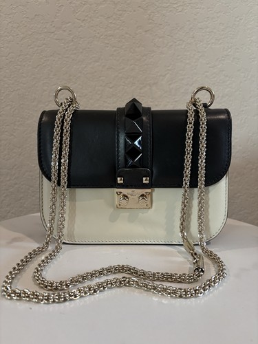 Valentino Garavani black and off-white Leather Rockstud Glam Lock Flap Bag