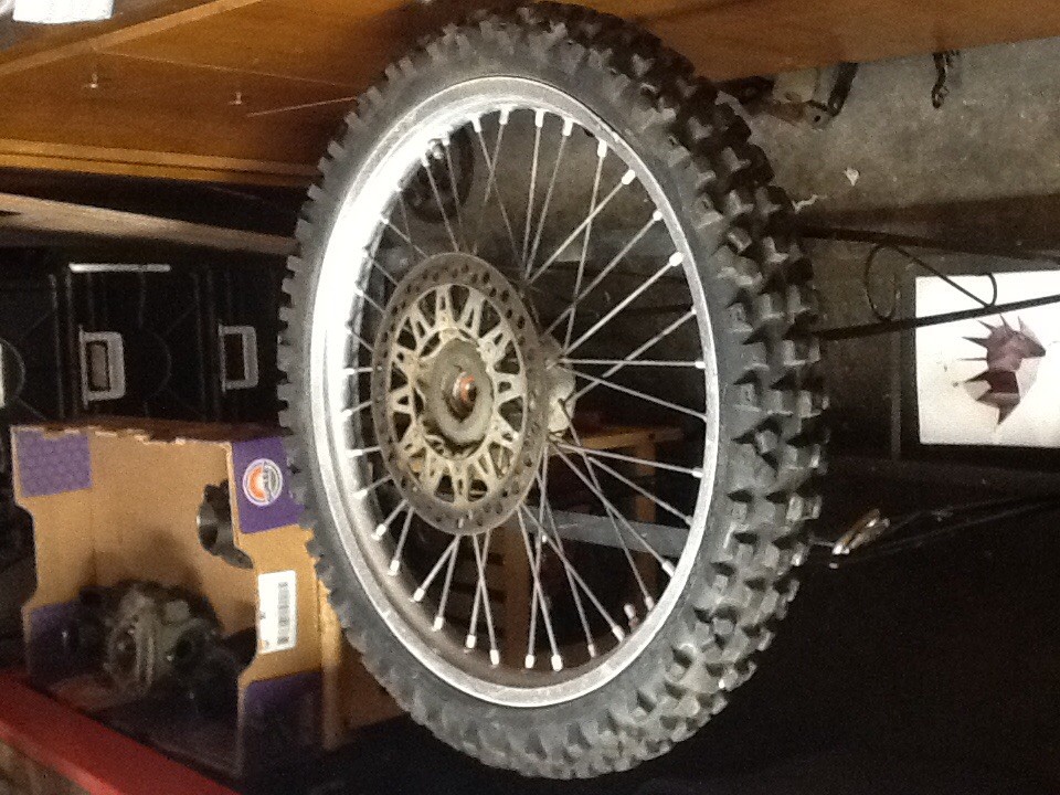 1990 Suzuki rm125 front wheel rim with front rotor and tire rm 125 1989