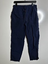 Blue small petite nurse scrubs pants worn with holes  