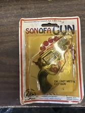 VTG DIE CAST METAL CAP GUN SON OF A GUN KEY CHAIN ZEE TOYS HONG KONG ORIG PKG