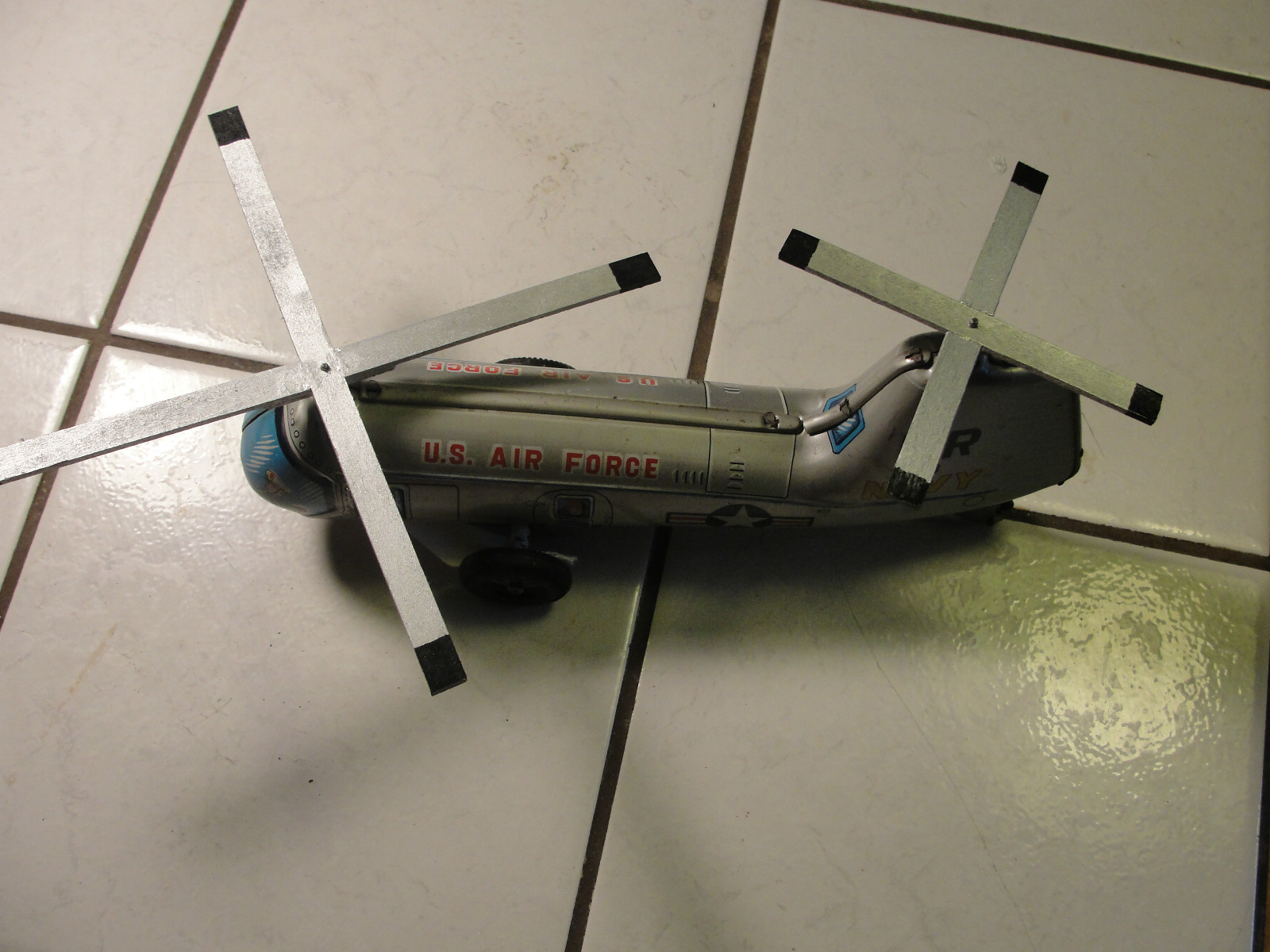 Old friction U.S. Air Force metal helicopter, Navy, three wheels, 2 propellers Old friction U.S. Air Force metal helicopter, Navy, three wheels, 2 propellers