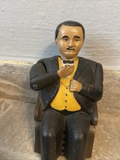 Antica banca meccanica in ghisa J&E STEVENS TAMMANY BANK il libro delle conoscenze