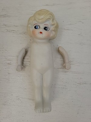 Vintage 7 inch tall Porcelain Kewpie Doll Made in Japan Jointed Arms Blue Eyes