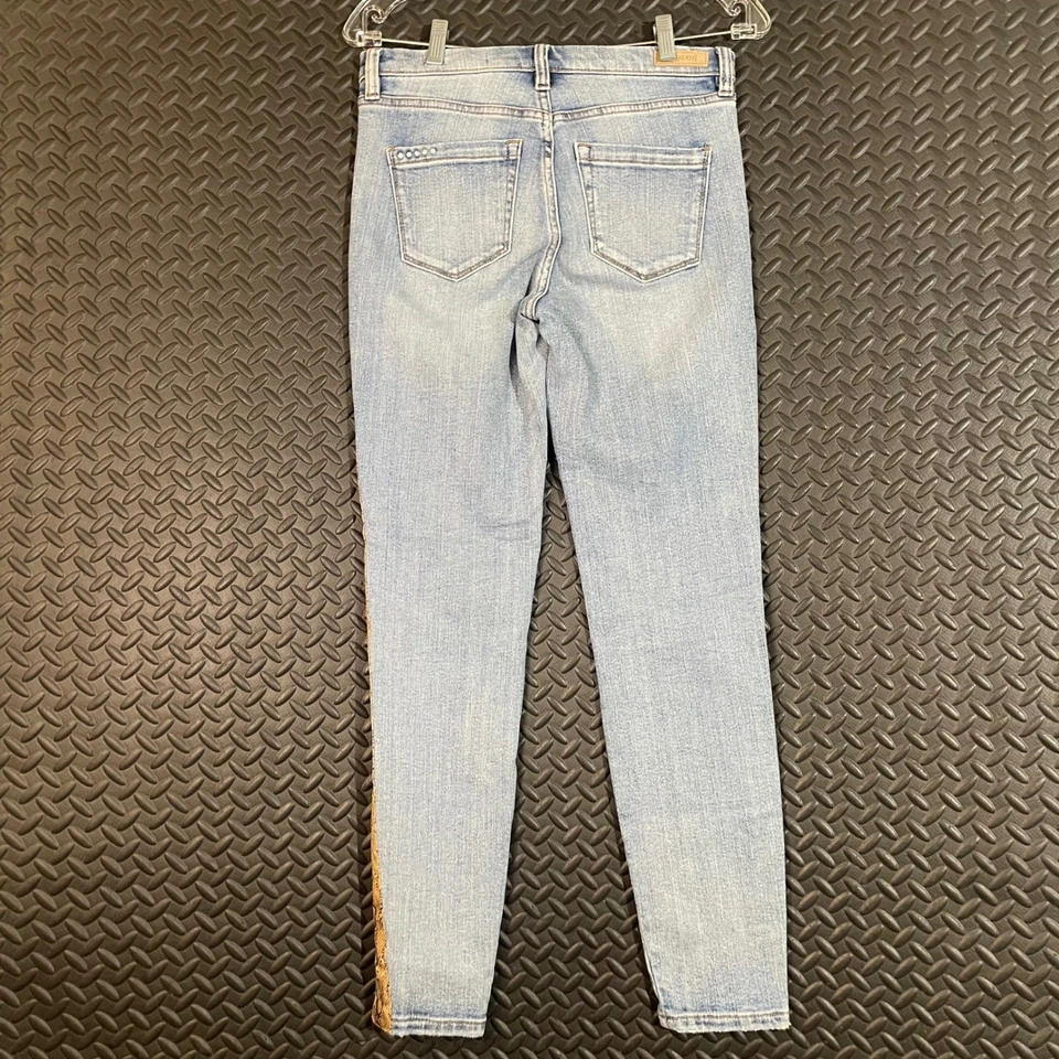 Pantalones de mezclilla ajustados con estampado de serpiente The Bond de Nueva York en blanco desgastados para mujer talla 26 Foto 2 de 4