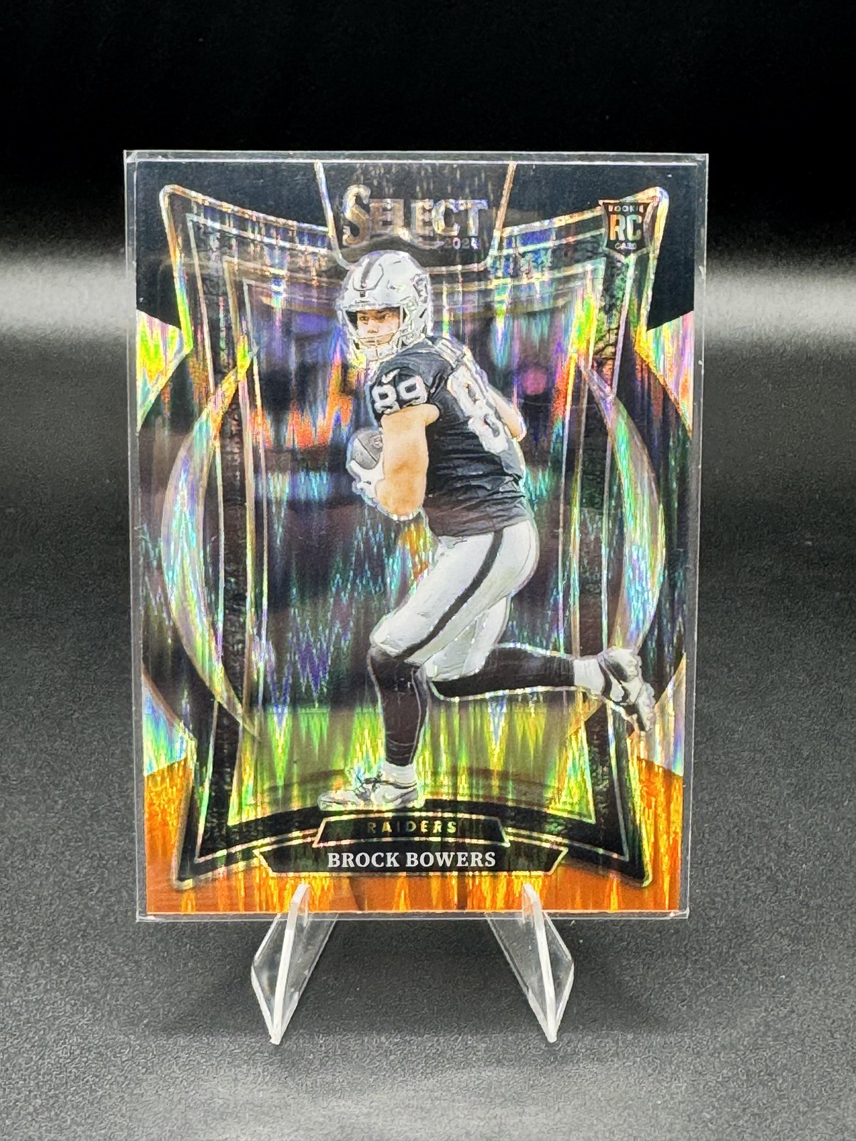 Brock Bowers Rookie 2024 Panini Select #31 Black & Orange Shock (RC)