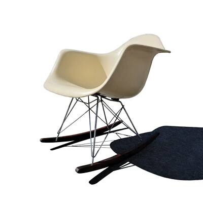 A mid century modern Eames RAR rocking shell armchair / rocker