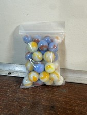 SMALL BAG OF MARBLES Yellow And White Swirls/ Blue And Red Swirls.   25-35